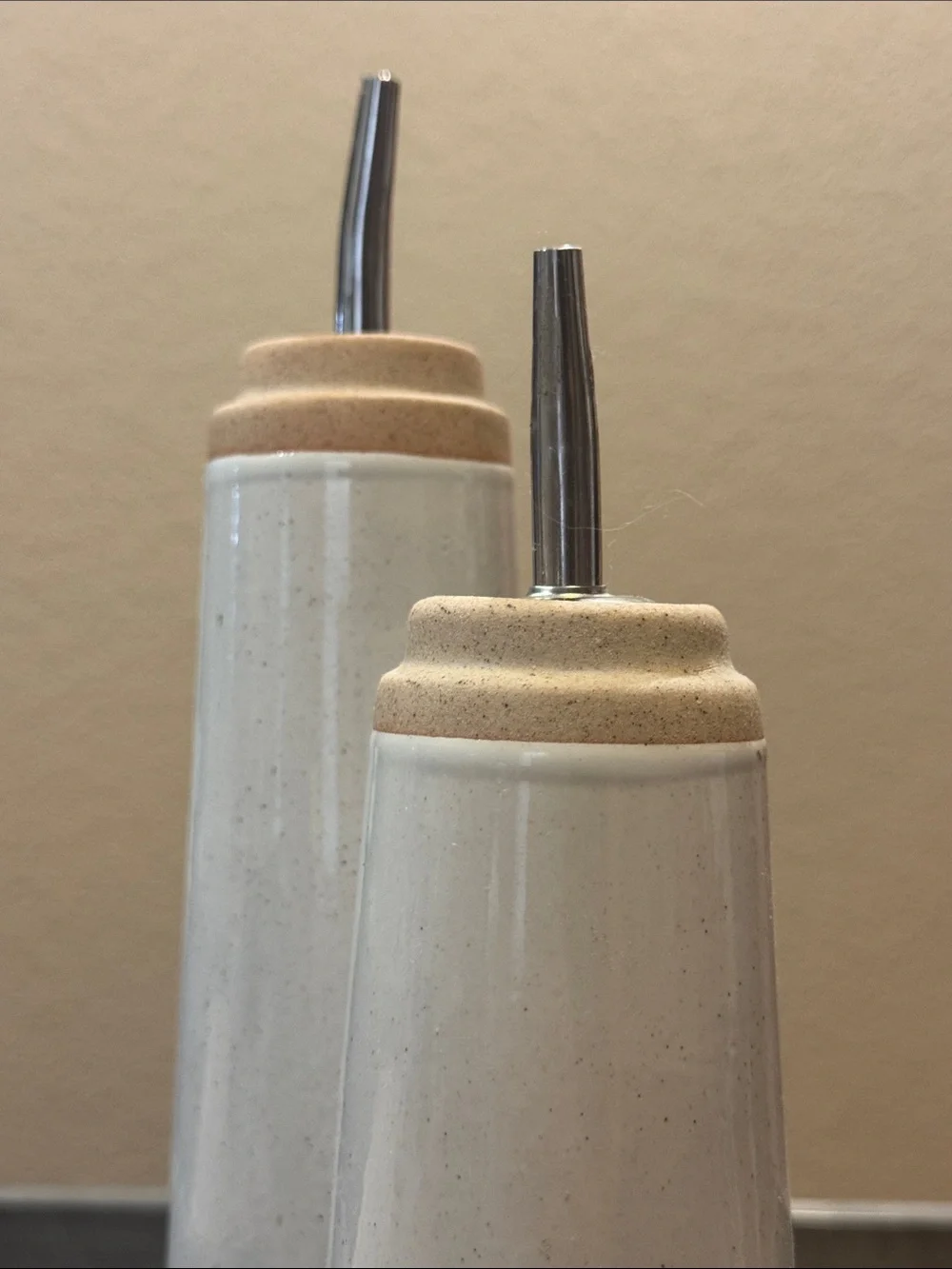 West Elm Ceramic Oil & Vinegar Pourers in White and Tan